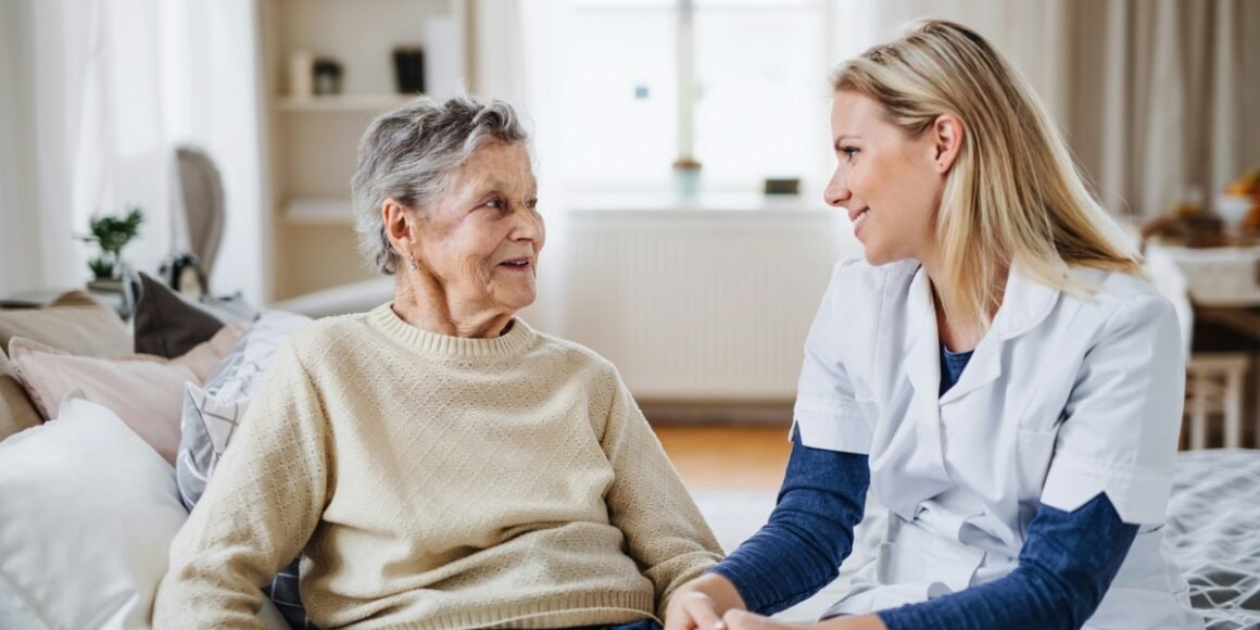 Private duty nursing is growing in home-based care for chronic illness. Male nurse supports patient at home.